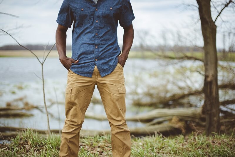 man standing and his hands in his cargo pants